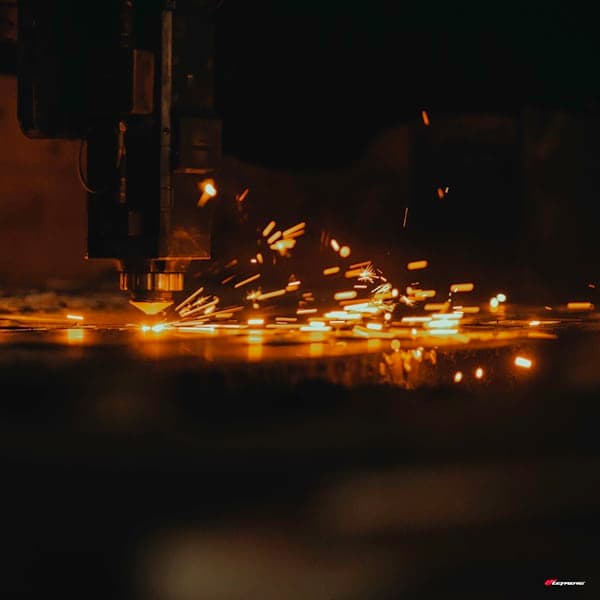 A CNC machining centre cutting metal stock