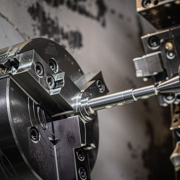 A CNC machining centre cutting metal stock